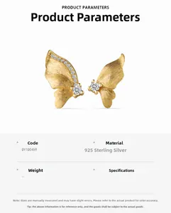Detail view of gold butterfly earrings in 925 sterling silver with sparkling zircon stones