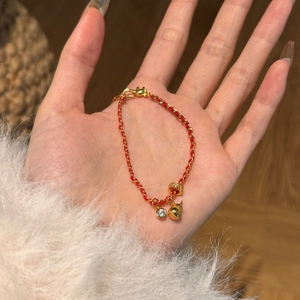 Braided red string bracelet with gold gourd pendant and crystal charm for women