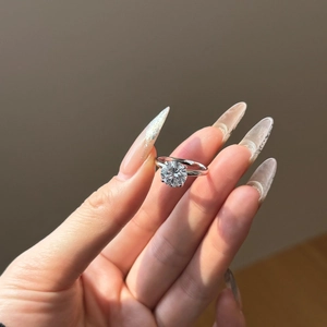 Detail of S925 sterling silver ring featuring a classic six-prong brilliant cut zircon