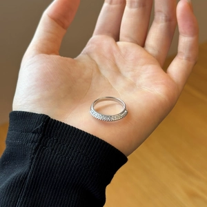Detailed close-up of S925 sterling silver stamp on the inner band of a double-row ring