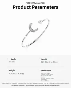 Detail of S925 sterling silver open bangle with cubic zirconia moon and heart charms