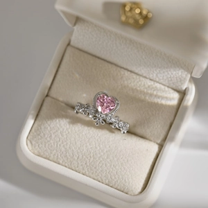 Detail of S925 silver ring featuring pink heart stone and floral micro-pave setting