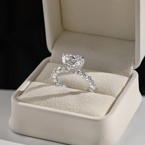 Detailed view of S925 sterling silver heart-shaped ring with ice-cut center stone