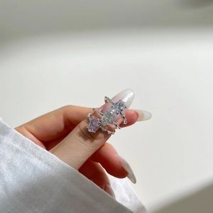 Three S925 sterling silver rings with oval ice-cut zircons in pink, gold and silver