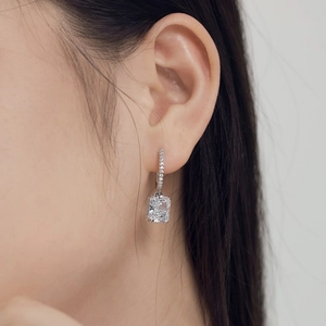 Elegant S925 sterling silver stud earrings featuring a large 8x10mm radiant cut zircon stone