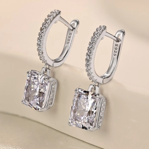 Close-up of S925 sterling silver earrings with large radiant cut cubic zirconia stones