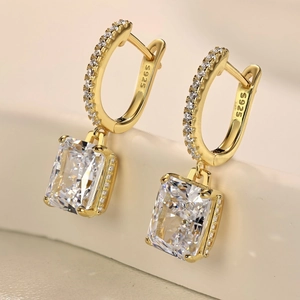 Macro shot of S925 hallmark on gold plated sterling silver earrings with ice cut zircon