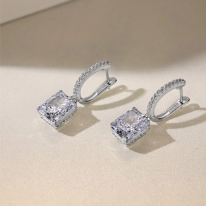 Detailed macro view of S925 sterling silver stamp and ice flower cut zircon earring