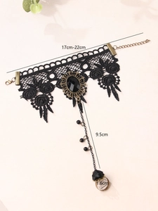 Detailed sizing of vintage black lace choker with gemstone and tassel pendant