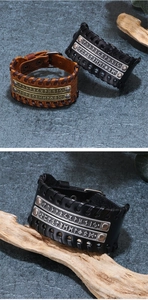 Close-up of vintage leather bracelet with Nordic runes and woven stitching detail