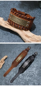 Detail of Viking leather bracelets with Runic bronze plates and braided edges