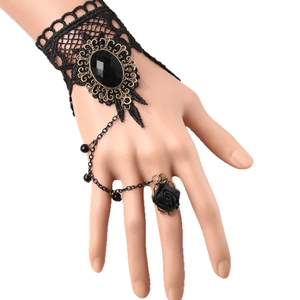 Gothic black lace wrist cuff with bronze relief gemstone and attached rose ring
