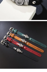 Detail view of punk skull leather bracelets in four colors with adjustable buckle