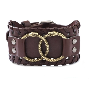 Brown leather wide bracelet with vintage gold interlocking snake motif and braided edges