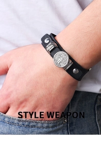 Retro black leather tree of life bracelet detail on model with rivet and metal ring