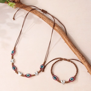Ensemble de Bijoux en Corde Cirée Tissée Main Bohème Pendentif Cœur en Alliage Perles Mauvais Œil Rose Bleu Collier Bracelet