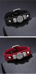 Dual view of black and red leather bracelets with Tree of Life metal buckle detail