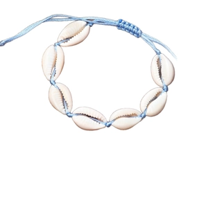 Handmade beach shell anklet with natural cowrie shells and light blue woven cord