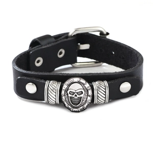 Adjustable black leather bracelet with silver skull charm and wrench details