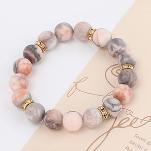 Pink and grey marble stone beaded yoga bracelet with sparkling gold rhinestone spacers