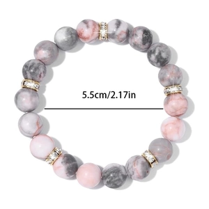 Detailed view of elastic beaded bracelet with grey marble beads and 5.5cm inner diameter