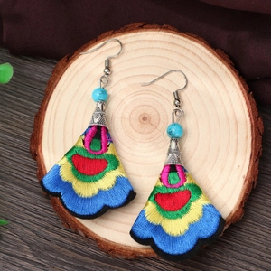 Ethnic bohemian fan-shaped embroidered earrings with colorful threads and turquoise beads