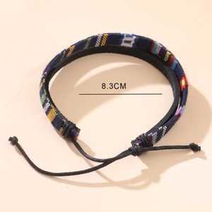 Ethnic handmade woven cotton linen bracelet with colorful geometric patterns and adjustable cord