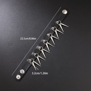 Punk black leather bracelet with silver metal rivets and adjustable snap buttons
