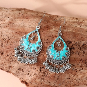 Bohemian silver drop earrings with teal enamel, scroll patterns and small bell tassels