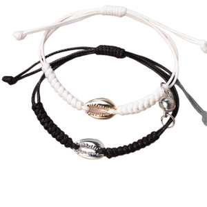 Adjustable woven shell magnet couple bracelets set in black and white cords