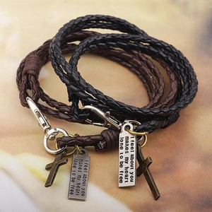 Handmade layered leather cross bracelet with vintage bronze charms and lobster clasp
