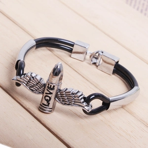 Close-up of punk wing charms and LOVE engraving on double-strand black PU bracelet