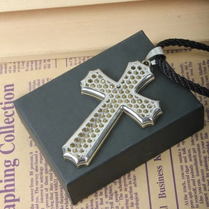 Hollow honeycomb cross pendant in silver stainless steel with black braided cord