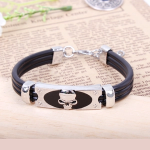 Punk alloy skull bracelet with triple-strand black woven cord and silver metal plaque