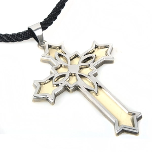 Victorian style cross pendant necklace in silver and gold tone with black woven rope