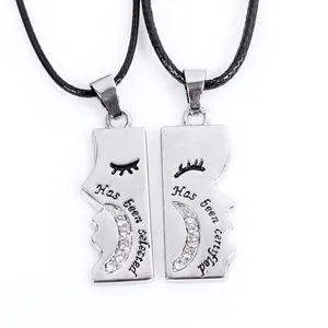 Couples pendant necklace set with crescent moon design and sparkling crystal accents