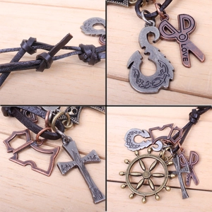 Retro multi-pendant necklace with leather cord featuring antique helm and cross charms