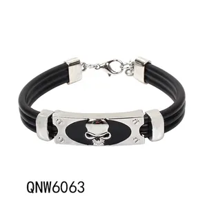 Punk style braided black rubber bracelet with silver skull metal plate and lobster clasp