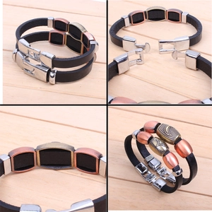 Detail of vintage multilayer leather bracelet with star and moon moon alloy charms