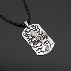 Gothic silver cross pendant necklace with honeycomb texture on black woven cord