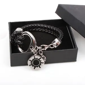 Bracelet pour homme en cuir tressé noir avec pendentif soleil et fermoir argenté