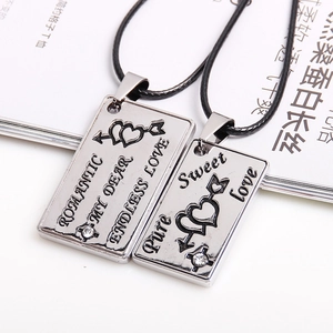 Romantic couple's alloy pendant necklace set with heart arrow engraving and clear crystals