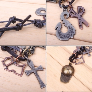 Detailed views of vintage braided leather bracelet with bronze charms and hat pendant