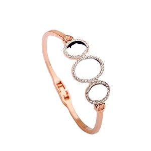 Rose gold bangle with three interlocking oval rings featuring micro-inlaid zircon stones