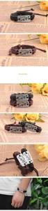 Close-up of hand-woven leather bracelets with engraved heart love metal plate