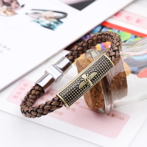 Vintage brown woven leather bracelet with bronze bee relief and magnetic clasp closure