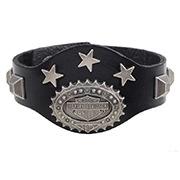 Detail view of a black leather biker bracelet with metal studs and engraved shield emblem