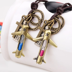 Retro bronze airplane necklace with blue and pink hourglass pendants and leather strap