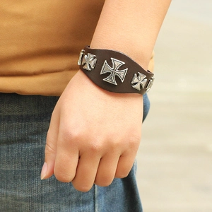 Punk style dark brown leather bracelet with silver Roman cross rivets and metal studs