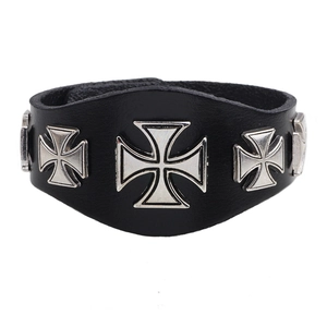 Punk black leather wristband with silver metal cross studs on a clean white background